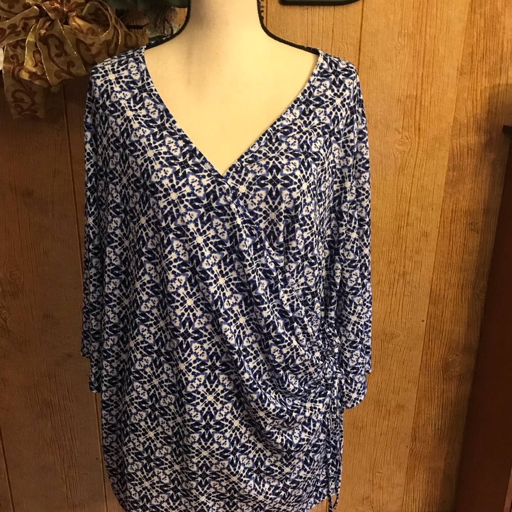 Beautiful blue and white blouse.